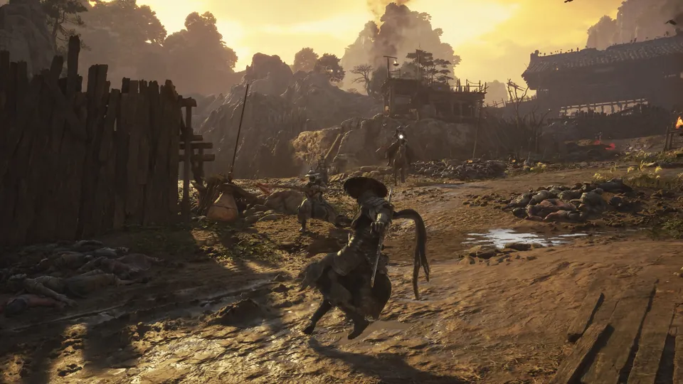 A warrior faces several opponents in a warm-toned mountain village in Phantom Blade Zero.